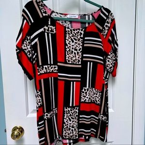 Calvin Klein multi patterned top Size 1X 95% Rayon 5% Spandex
